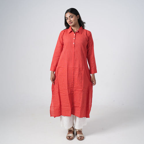 Coral Red Long Shirt for women featuring subtle vertical patterns, a classic shirt collar and a button-down front
