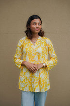 Sunshine Bloom Cotton Peplum Top