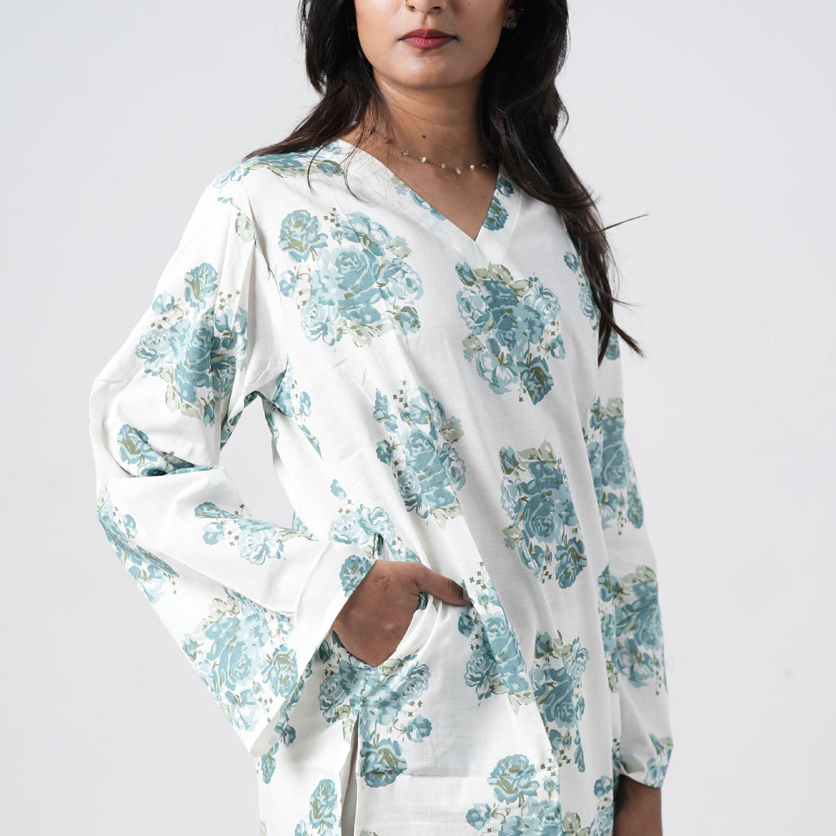 Aqua blue floral short kurti for women with side pockets