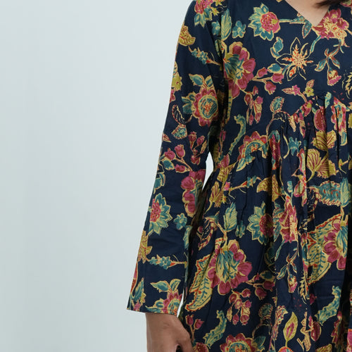 Arohi Garden Flared Kurti with long sleeves featuring a colourful floral print on a navy blue background