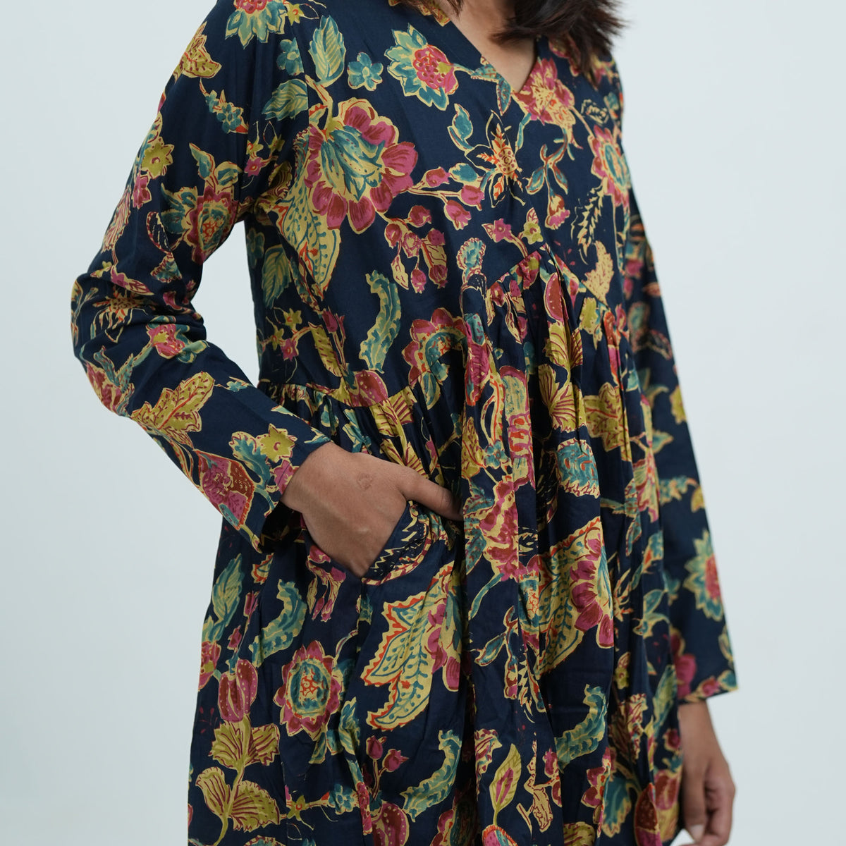 Arohi Garden Flared Kurti in navy blue with colourful floral prints and a gathered waist design