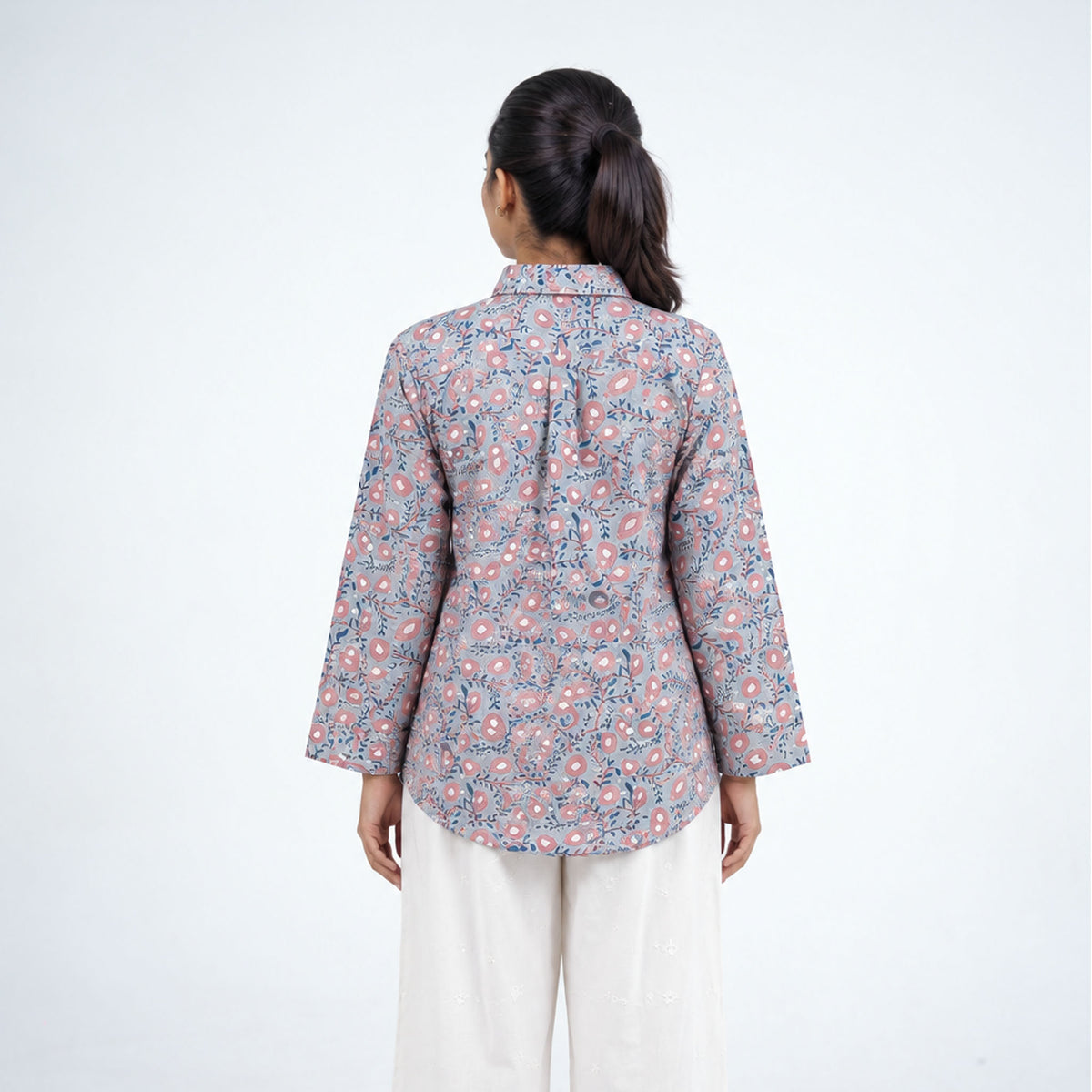 Back view of Blush Ivy Short Shirt featuring pink and blue floral prints on a grey base