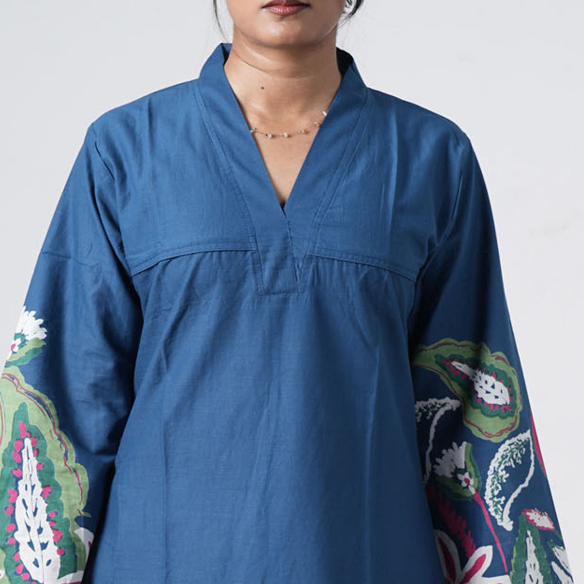 Boho Neel Long Kurti with a V neckline and a simple blue bodice