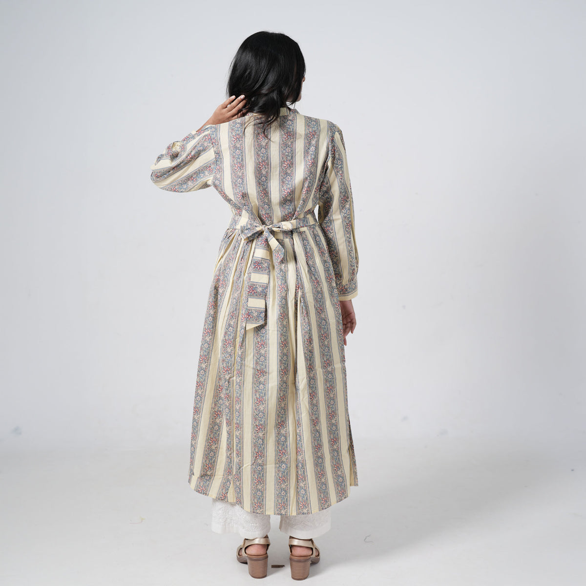 Back view of Desert Willow Long Kurti featuring cream fabric with blue and pink floral stripe prints and a flowing silhouette