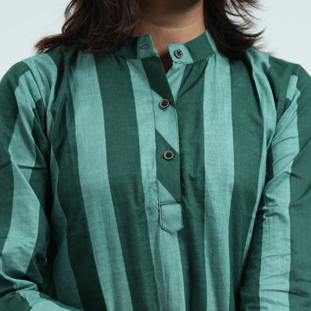 Forest Stripe Cord Set with a band collar, buttoned neckline and green vertical stripe pattern