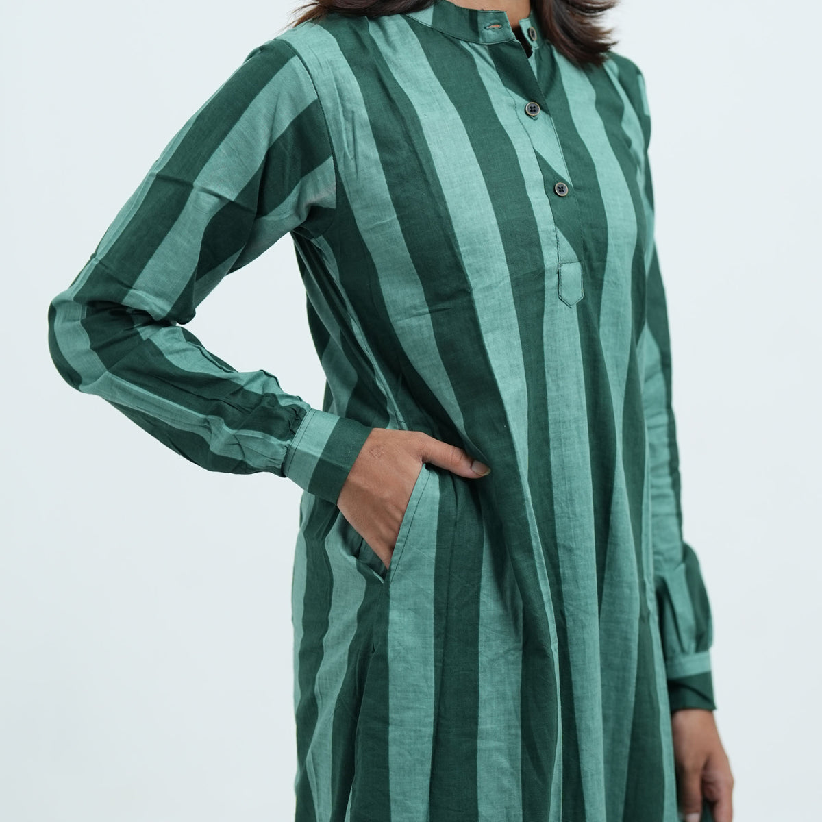 Forest Stripe Cord Set featuring a green striped long kurta with a pocket detail and matching striped pants