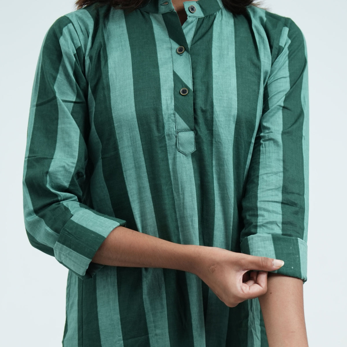 Forest Stripe Cord Set featuring long sleeves with green vertical stripes and buttoned cuffs
