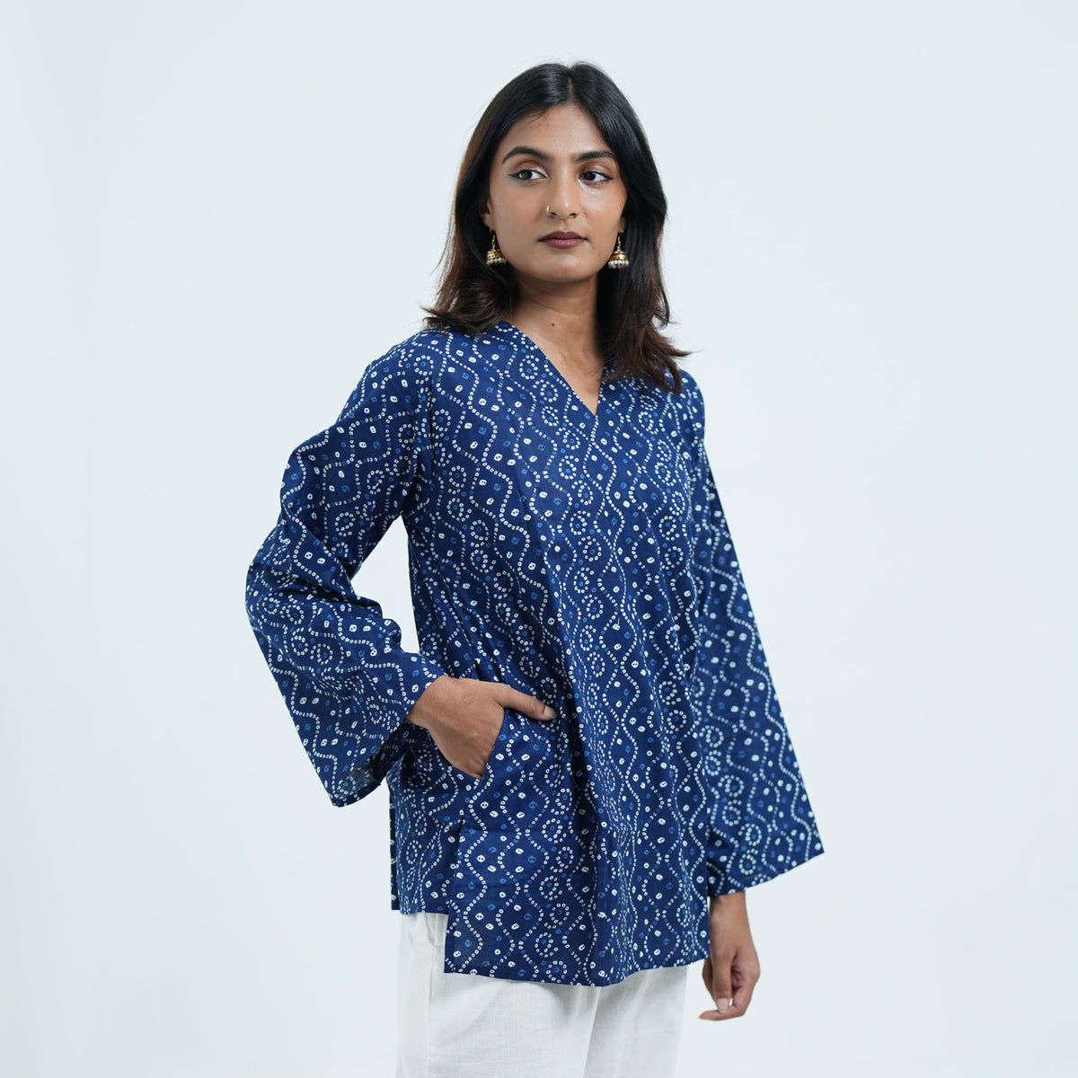 Indigo Wave Short Kurti in navy blue featuring white dotted wave patterns and a pocket detail