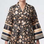 Kaala Rang black printed long kurti with V neckline and floral patterns