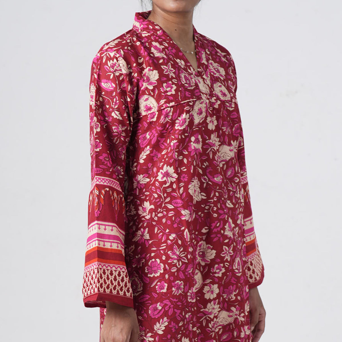 Laal Rang Long Kurti featuring wide flared sleeves with pink, cream and red decorative border prints