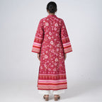 Back view of Laal Rang Long Kurti featuring deep red fabric, floral prints and decorative border patterns