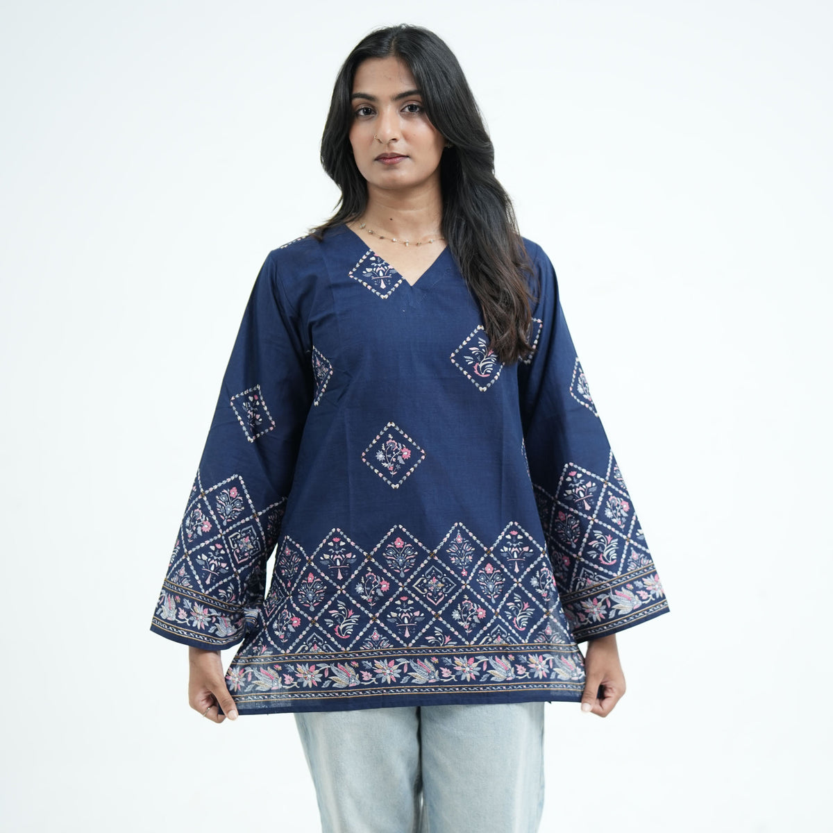 Luna Short Kurti for women in navy blue with pink and white geometric floral prints, a V neckline and decorative border patterns