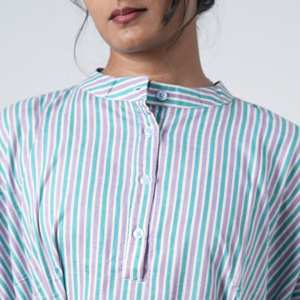 Mint Lane Oversized Shirt with a band collar and front button placket in a mint green and blue striped design
