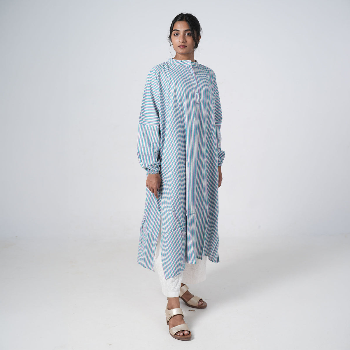 Mint Lane Oversized Shirt for women featuring mint green, blue and white vertical stripes with a relaxed longline fit