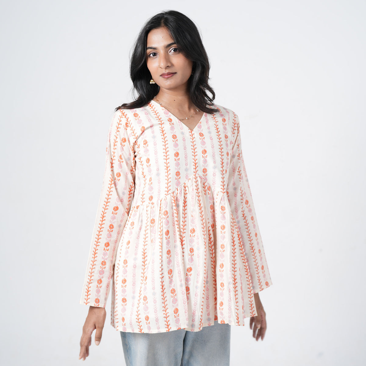 Mogra white flared kurti for women with orange and pink floral prints