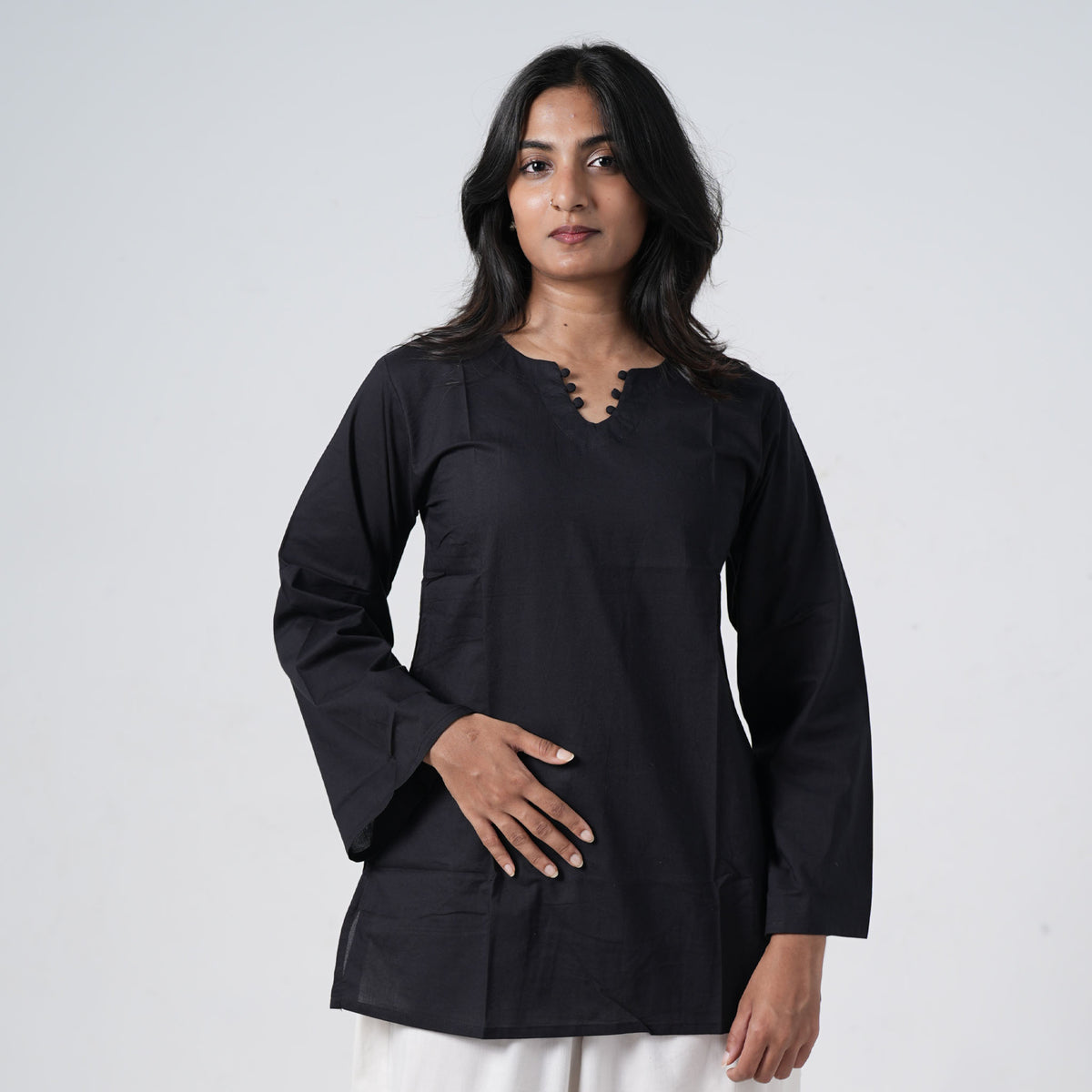 Nisha Short Kurti for women in black with a stylish V neckline and a relaxed fit