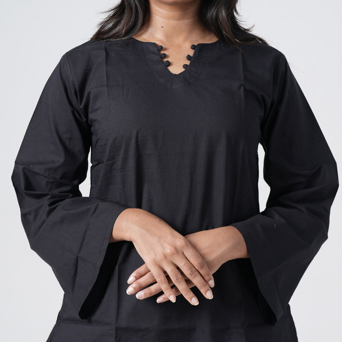 Nisha Short Kurti featuring long flared sleeves in black