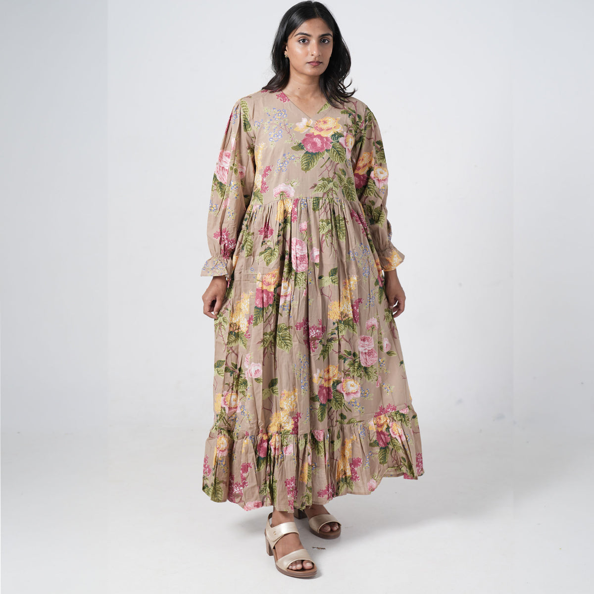 Olive Bloom Long Kurti for women in beige with colourful floral prints, a V neckline and a tiered flared hem