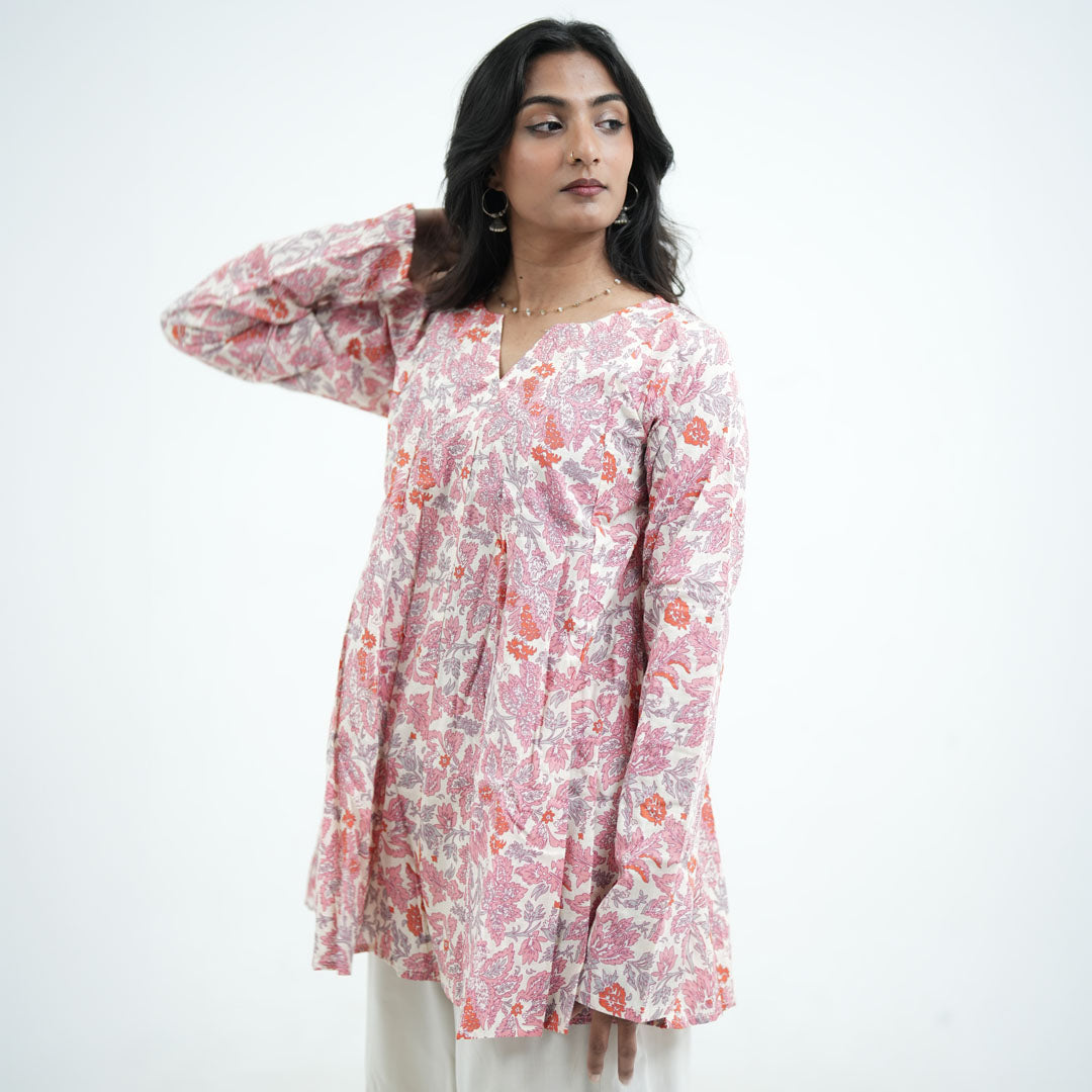 Rosette Umbrella Kurti featuring a V-shaped neckline with pink and coral floral prints