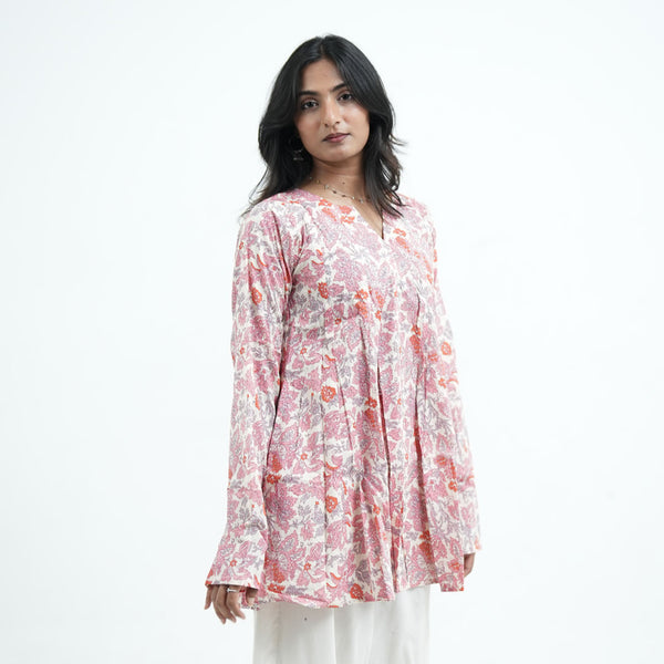 Rosette Umbrella Kurti for women featuring pink, coral and grey floral prints on an ivory base with a flared silhouette