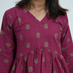 Rubi Flared Kurti with a V neckline and small traditional motifs on wine-coloured fabric
