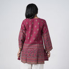 Back view of Rubi maroon knee length kurti with decorative floral print borders