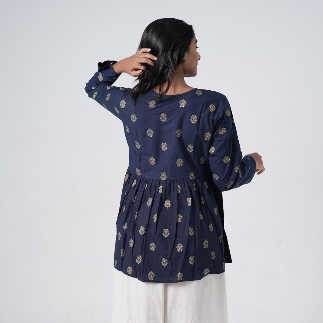 Back view of sapphire blue printed flared kurti for women