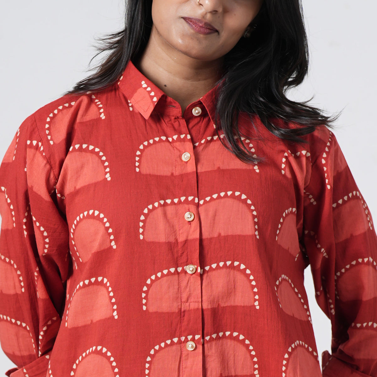 Sun Rise red long shirt featuring a classic collar and front button design