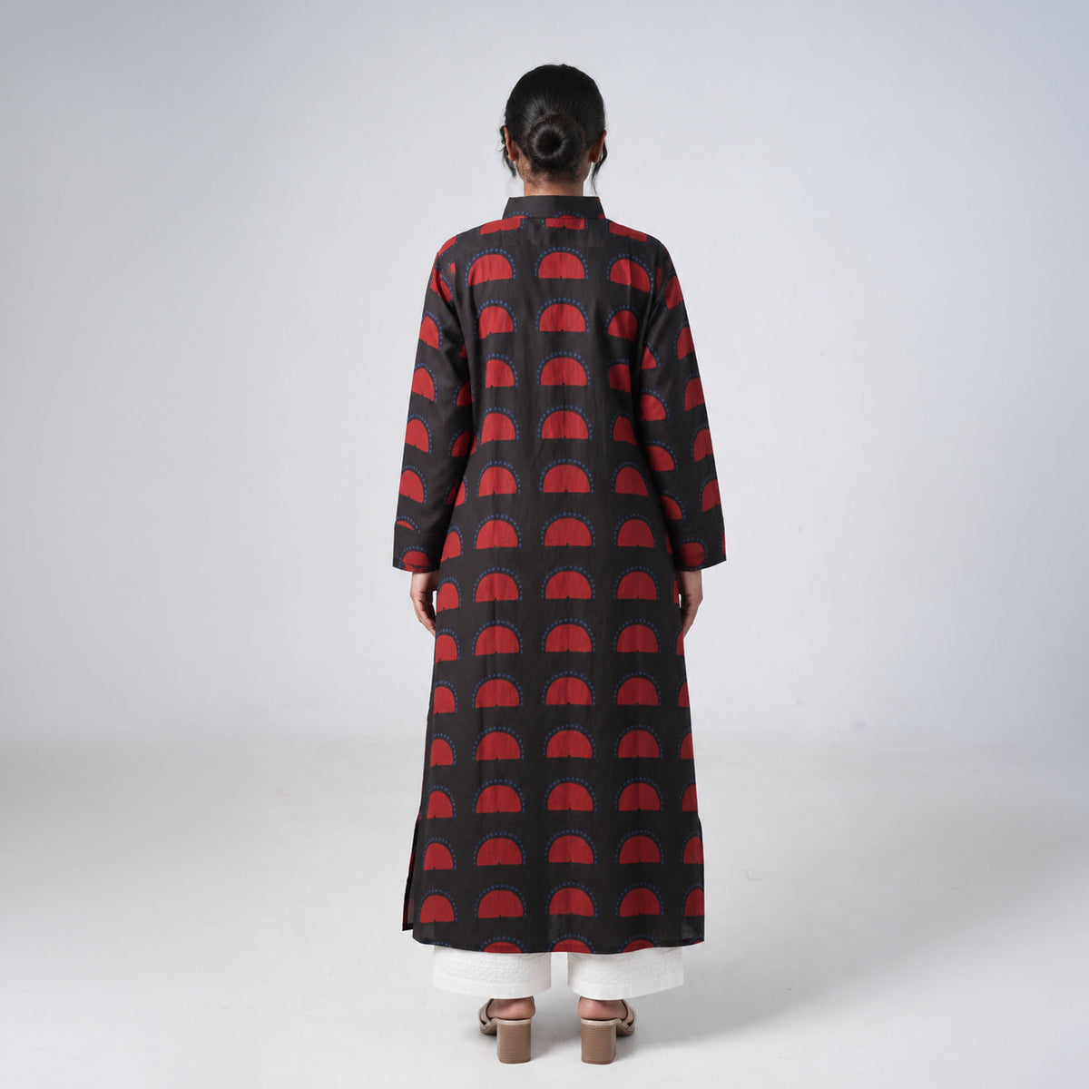 Back view of Sun Set black and red printed long shirt with geometric patterns