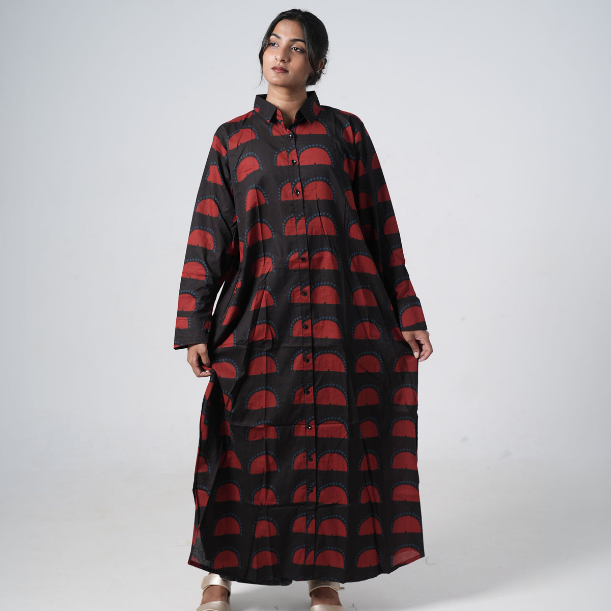 sSun Set black and red long shirt featuring a collared neckline and front buttons