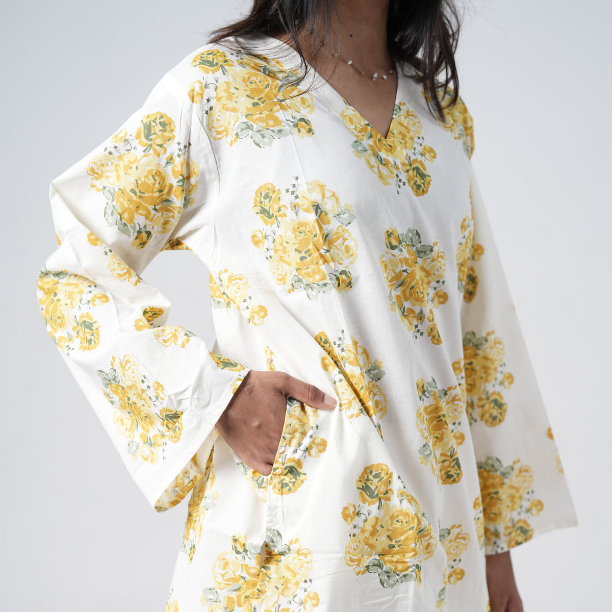 Yellow floral short kurti for women with side pockets and rose prints